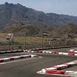 From the viewing platform at Karting Garrucha near Mojacar - a place for Go Carting. Looking at the track with some hills in the distance.