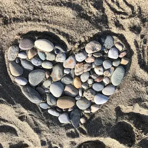 Stones in the shape of a heart on a beach in Mojácar